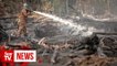 Sarawak Bomba goes all out to douse forest fires before schools reopen