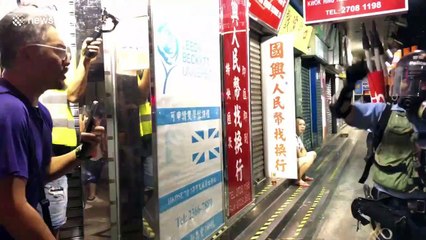 Hong Kong protester uses steel bowl to neutralise tear gas canister