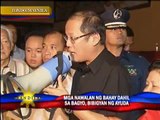 Aquino visits ‘Basyang’ victims, distributes relief goods