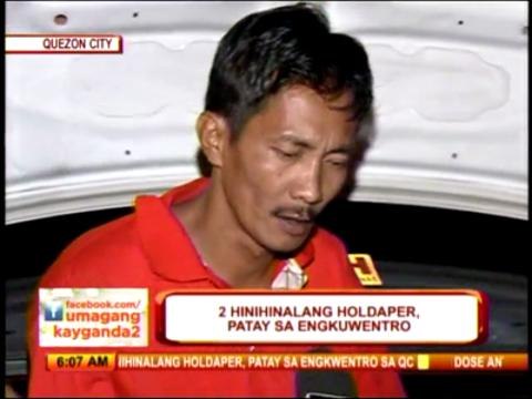 2 robbers gunned down in QC