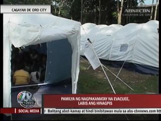 Kin of evacuee who committed suicide mourn