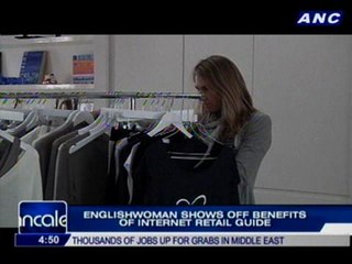 Englishwoman shows off benefits of internet retail guide