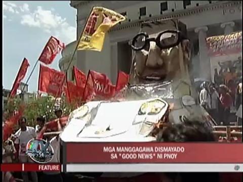 Labor groups slam Aquino over wage hike