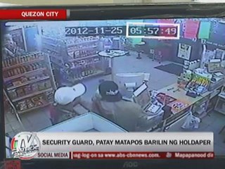 Security guard shot in store hold-up