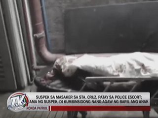 Massacre suspect dies inside police car
