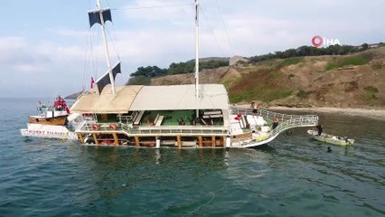 Sinop’ta karaya oturan gezi teknesini kurtarma çalışmaları başladı