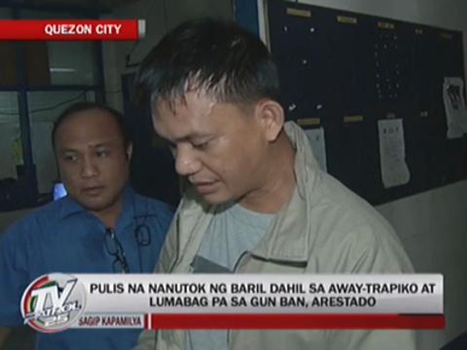 Cop arrested for violating election gun ban
