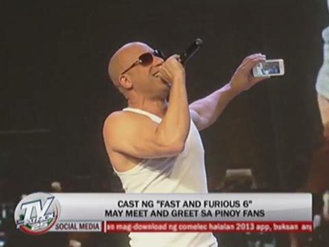 Shrieks as Vin Diesel goes topless at meet-and-greet