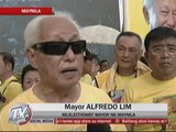 Lim strikes back at Estrada at campaign launch