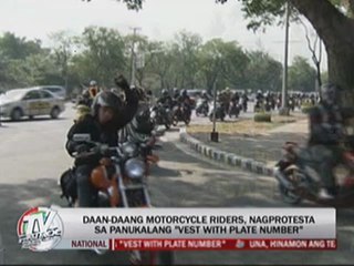 QC bikers protest 'vest with plate policy'
