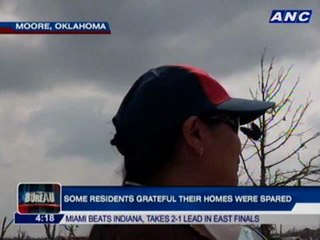 Tornado survivors turn to faith