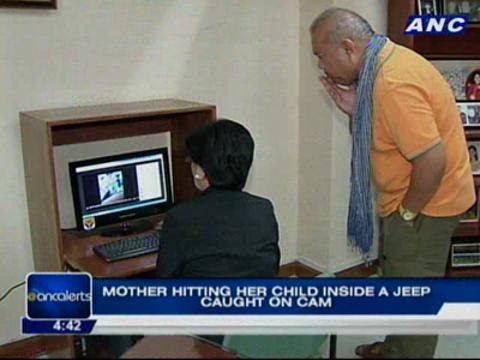 Mother hitting her child inside a jeep caught on cam