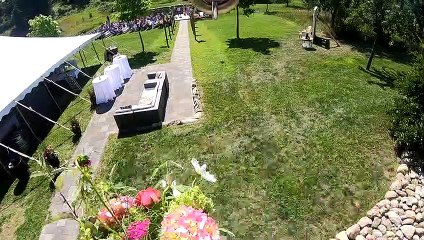 Bride Zip Lines Down the Aisle