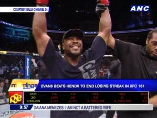 Evans beats Henderson by split decision