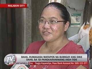 Скачать видео: 'Strange' high tide triggers floods in Malabon