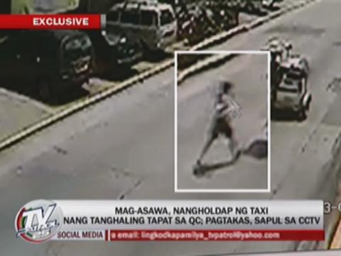 Couple arrested for robbing taxi in QC