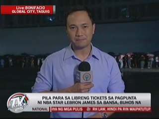 Hundreds brave rains for free tickets to LeBron event