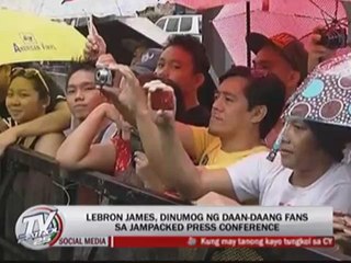 Fans brave rains to catch glimpse of LeBron