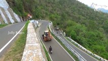 Heavy Load Milk Tanker Lorry at Edge Of Dangerous Hairpin Bend