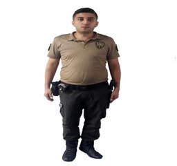 Sahte bekçiyi gerçek polis yakaladı