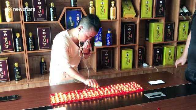 Kung fu master blows out 120 candles using EARS