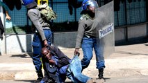 Analysis: Zimbabwe police violently break up protests after court ban