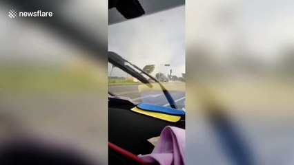 Powerful tornado blows down trees and breaks car windows in China