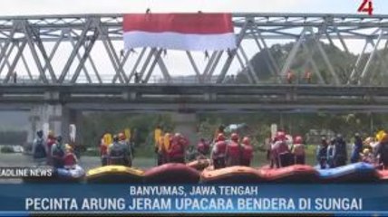 Ratusan Pecinta Arung Jeram Upacara Bendera di Tengah Sungai