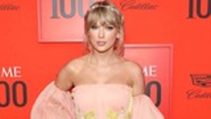 Taylor Swift Jokes With Fans Through "Five Holes in the Fence" Photo Ahead of Album Release | Billboard News