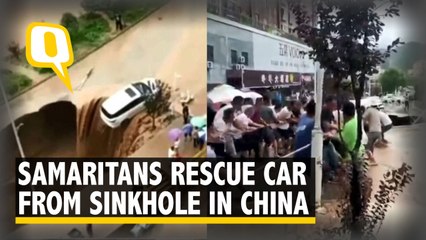 Good Samaritans Save Car From Falling Into Sinkhole