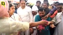 Smriti Irani lends a shoulder to mortal remains of Surendra Singh, ex-village head of Barauli, Amethi, who was shot dead last night.