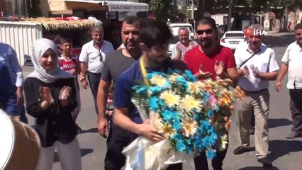 Dünya şampiyonu Kerem Kamal omuzlarda karşılandı