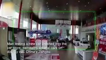 Çin'de test sürüşü yapan araba, otomobil mağazasının içine girdi