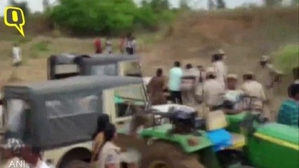 Descargar video: Mob Led by TRS MLA’s Brother Thrashes Telangana Woman Forest Officer