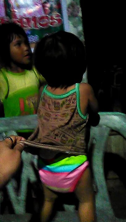 Father and daughter dancing the momoland dance from the philippines