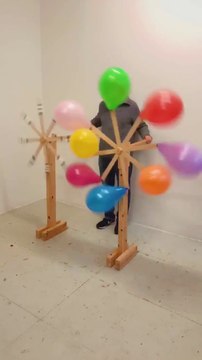 This Guy Takes Balloon Popping to a Whole New Level