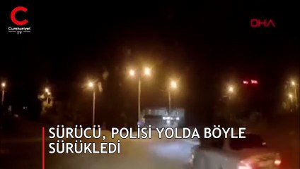 Sürücü, polisi yolda böyle sürükledi