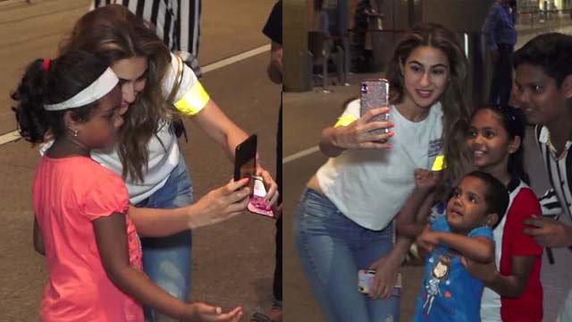 Sara Ali Khan clicks selfie with her little fans at airport;Watch video | FilmiBeat