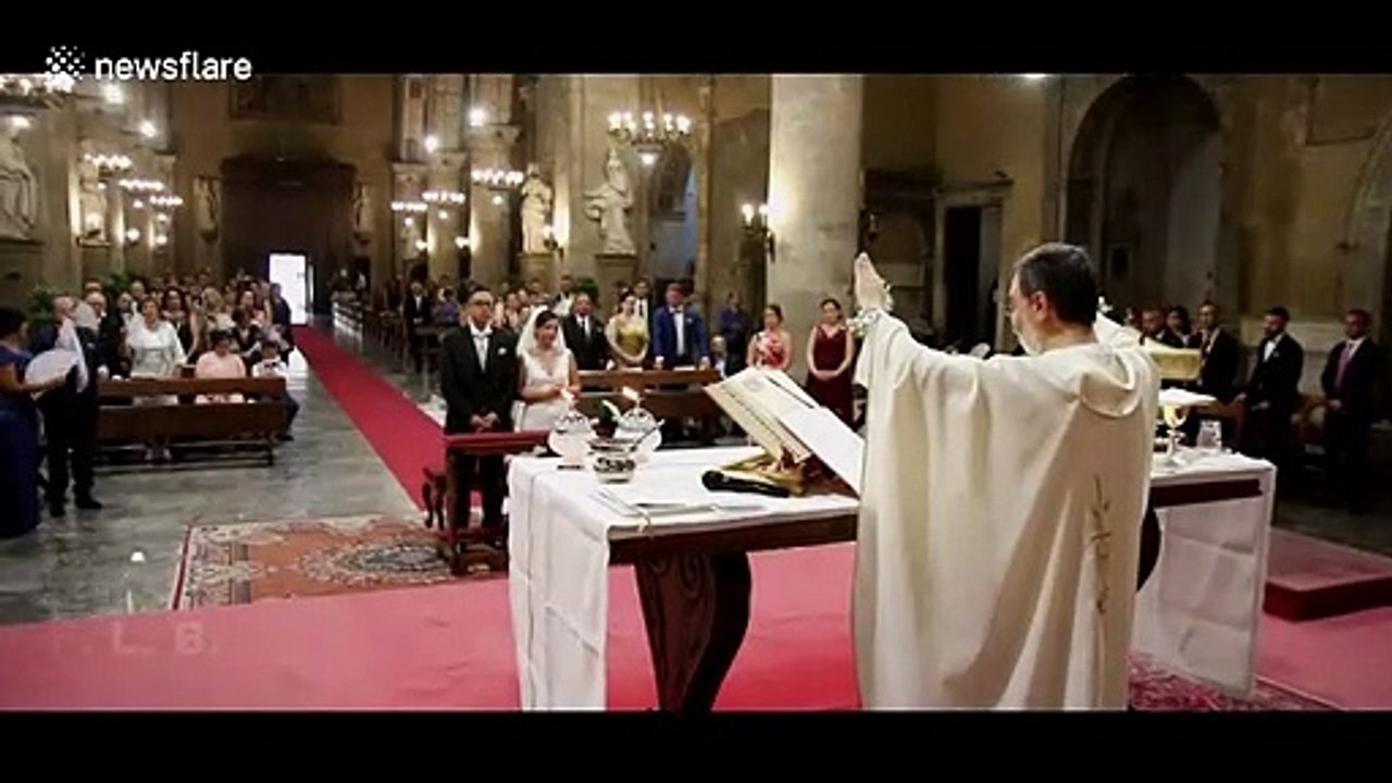 Incredible moment lightning causes Italian church to lose power during final blessing at wedding