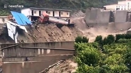 Strong rainstorm sees floods and mudslides wreck Chinese city, killing eight people