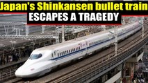 Japan's Shinkansen bullet train runs for a minute with door wide open