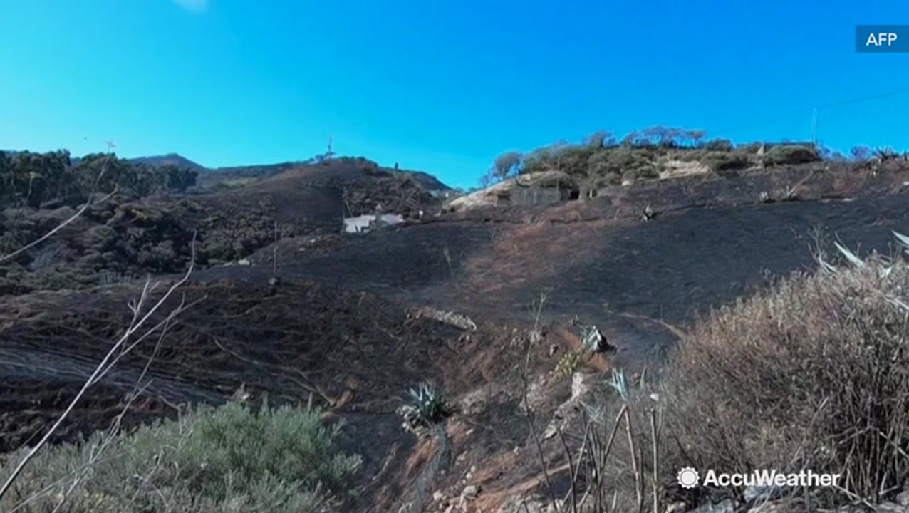Hills scorched after wildfire rages through more than 10,000 acres