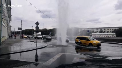 Broken pipes see fountain of boiling water spurt out of road in Moscow