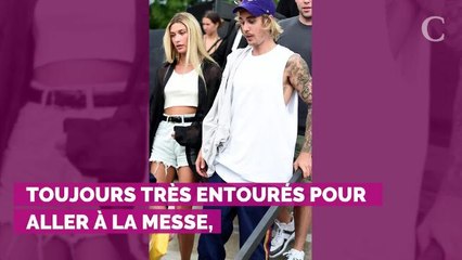 PHOTOS. Quand Justin Bieber essaye tant bien que mal de se cacher des photographes à la sortie de l'église
