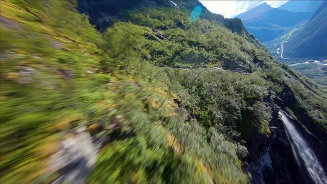 Drone Dives Down Narrow Norwegian Cliffs
