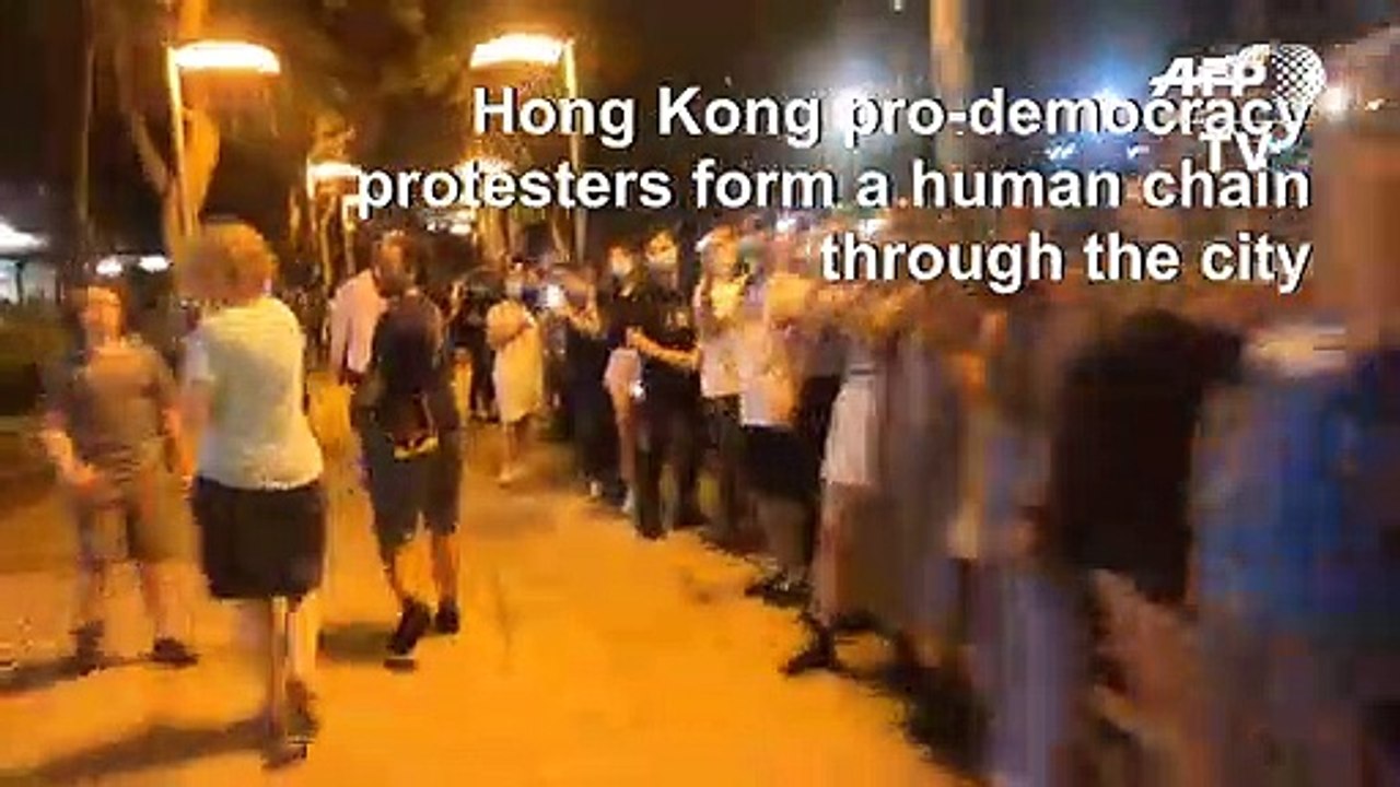 Hong Kong pro-democracy protesters form human chain