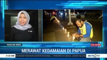 Masyarakat Papua Nyalakan Lilin Perdamaian di Pinggir Jalan