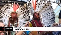 Indigenous protesters and environmental activists call to protect rainforest