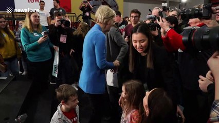 Democrat hopefuls Warren and Biden hold rallies in Iowa ahead of key vote