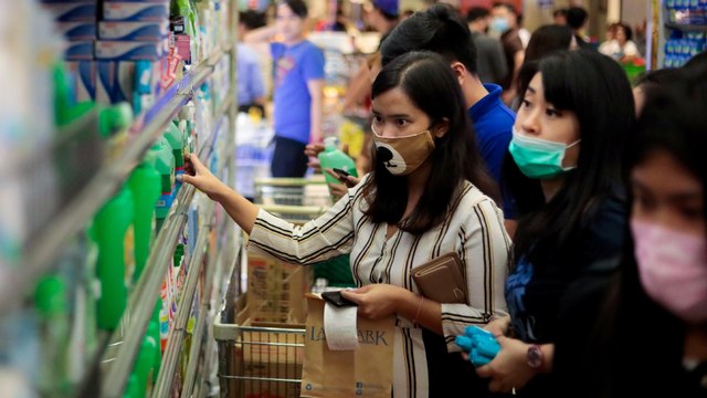 Philippines reports coronavirus death, China toll reaches 304
